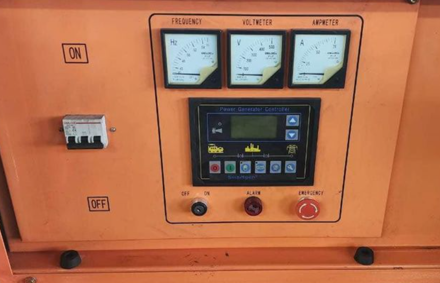 Diesel generator control panel with frequency, voltage and amp meters